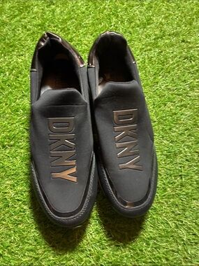 DKNY Black Slip-On Loafers with Metallic Logo